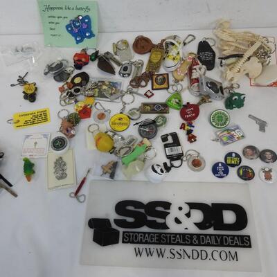 Lot of assorted Keychains and Buttons, Shoes, Dinosaur Bones