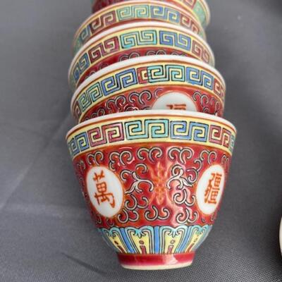 Chinese teapot, cups, bowls, spoons