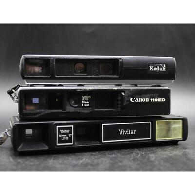 Vintage Lot of Pocket Cameras Canon, Vivitar, & Kodak