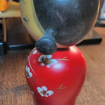 small wood figure