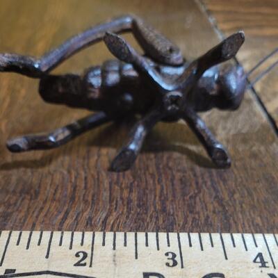 Small metal cricket