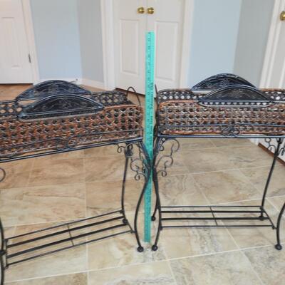 Metal plant stands with decorative baskets