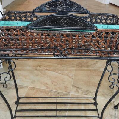 Metal plant stands with decorative baskets