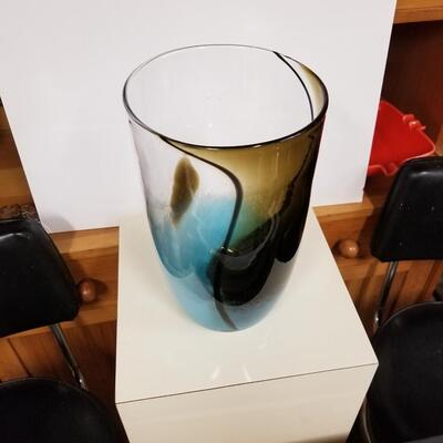 Oversized vintage art glass vase with engaging abstract design