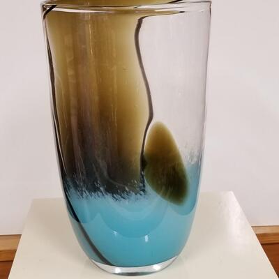 Oversized vintage art glass vase with engaging abstract design