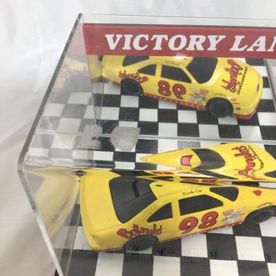 (94) NASCAR | Victory Lane Display and 1:24 Scale Die Cast Banks