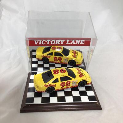(94) NASCAR | Victory Lane Display and 1:24 Scale Die Cast Banks