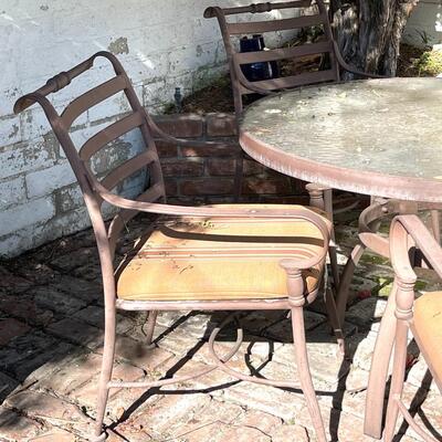 LOT 13   METAL PATIO TABLE GLASS TOP 6 ARMCHAIRS