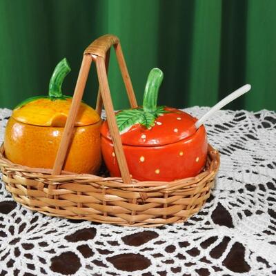 Strawberry and orange marmalade jelly jars