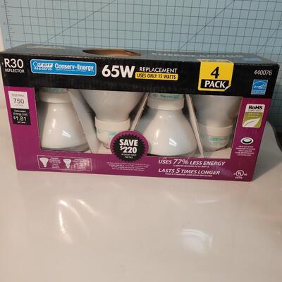 4 pack energy saving compact florescent light bulbs 65 W
