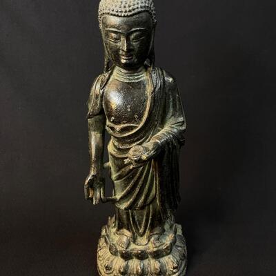 Beautiful Antique Standing Bronze Temple Buddha holding an offering