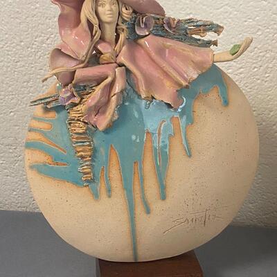 Signed Handpainted Pottery Disc Statues Man and Woman