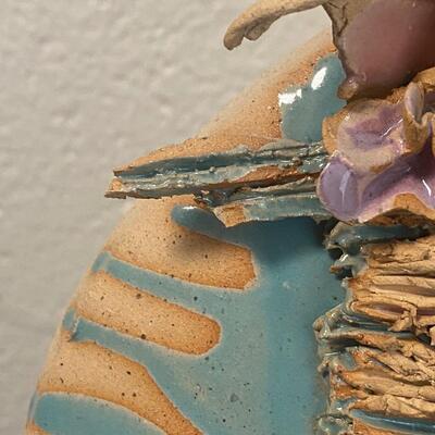 Signed Handpainted Pottery Disc Statues Man and Woman