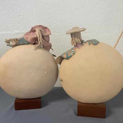 Signed Handpainted Pottery Disc Statues Man and Woman