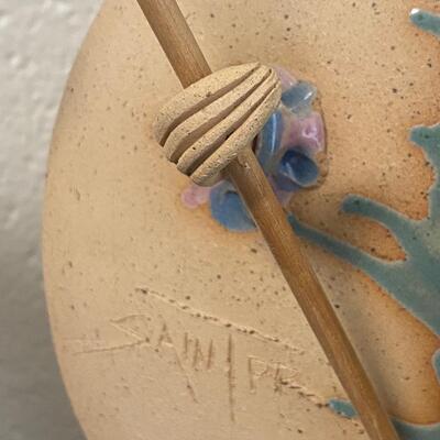 Signed Handpainted Pottery Disc Statues Man and Woman