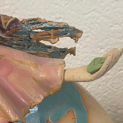 Signed Handpainted Pottery Disc Statues Man and Woman