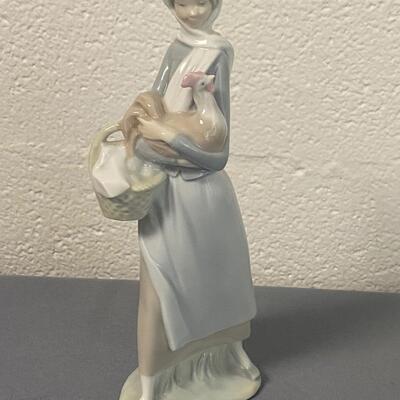 Lladro Porcelain "Woman Holding Rooster and Egg Basket" Figurine