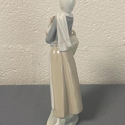 Lladro Porcelain "Woman Holding Rooster and Egg Basket" Figurine