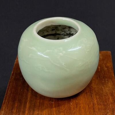 A Celadon Green Miniature Ceramic Seed Pot with Flying Cranes
