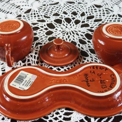 Fiesta ware cream and sugar.