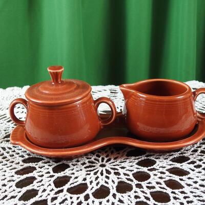 Fiesta ware cream and sugar.