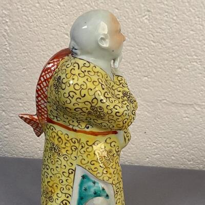 Chinese Man with Fish Statue