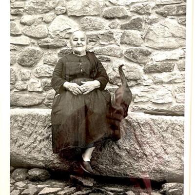 Lot 34 Framed Photo Old Woman By Stone Wall by Candia Navarro