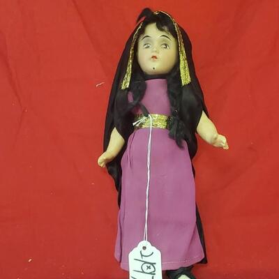 Plastic Doll in Purple Dress