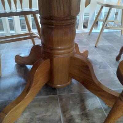 LOT 67   OAK PEDESTAL TABLE & CHAIRS