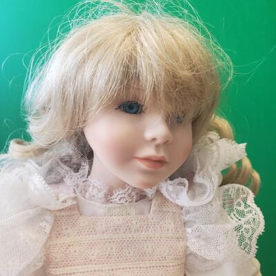Porcelain Doll with White and Pink Dress