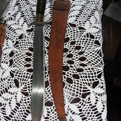 Three unique long bladed swords /knives/bolos