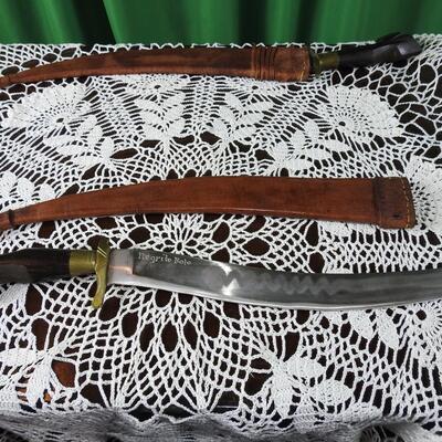 Three unique long bladed swords /knives/bolos