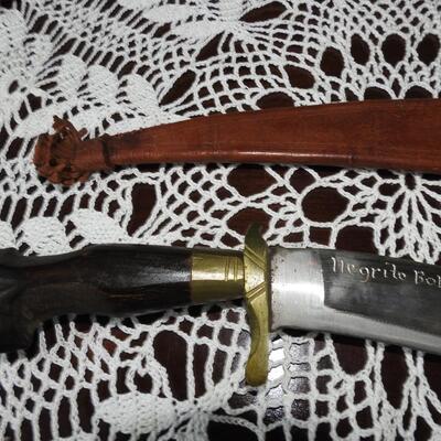 Three unique long bladed swords /knives/bolos