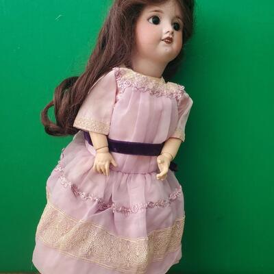 Doll in a Purple Dress