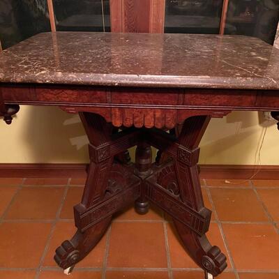 Antique Eastlake pedestal table with granite top