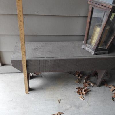 Wood bench and lantern