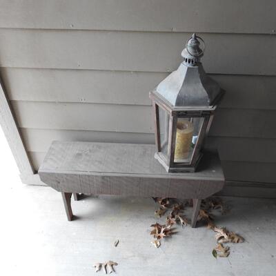 Wood bench and lantern