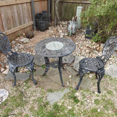 Cast iron bistro table with 2 chairs