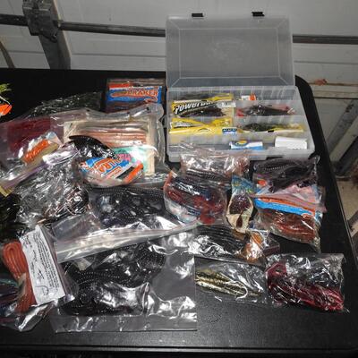 Large assortment of plastic fishing worms and tackle