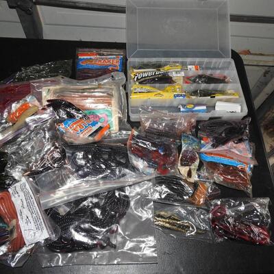 Large assortment of plastic fishing worms and tackle
