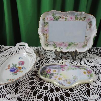 Trio of beautiful  Limoges and German trays