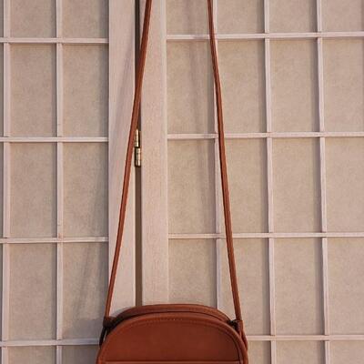 Lot 101: Vintage Original COACH Brown Leather Purse.