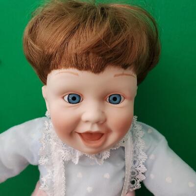 Porcelain Doll With Blue Hearted Shirt