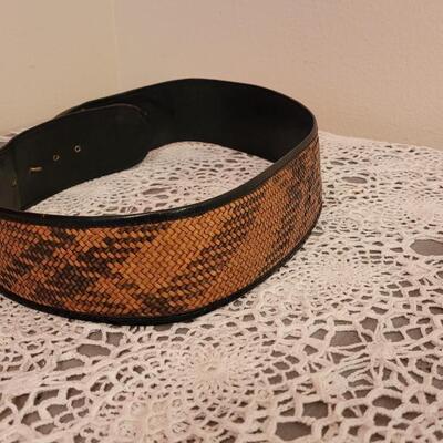Lot 119: Wide Belts â—‡ Metallic Leather - Leather, Woven and Brass Buckle Belts