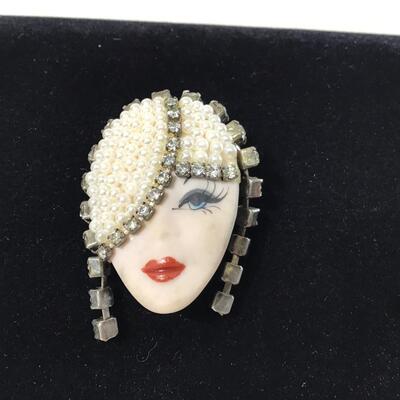 Vintage Elvira & Jackie porcelain face brooch