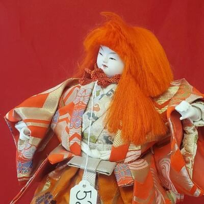 Japanese Doll With Orange Hair