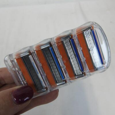 Qty 20 Razor Blade Refills. 4 Blades on each. Gray/Orange. No packaging - New