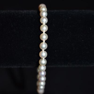 14 karat gold and cultured pearl bracelet and necklace set