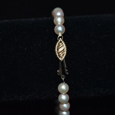14 karat gold and cultured pearl bracelet and necklace set