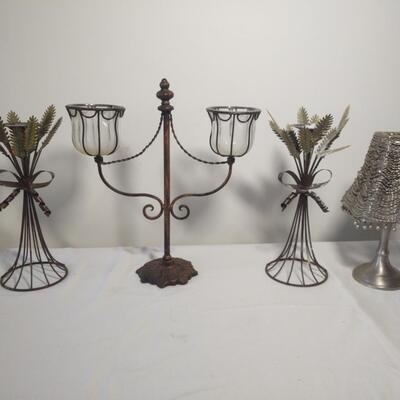 Four Decorative Metal Candle Holders